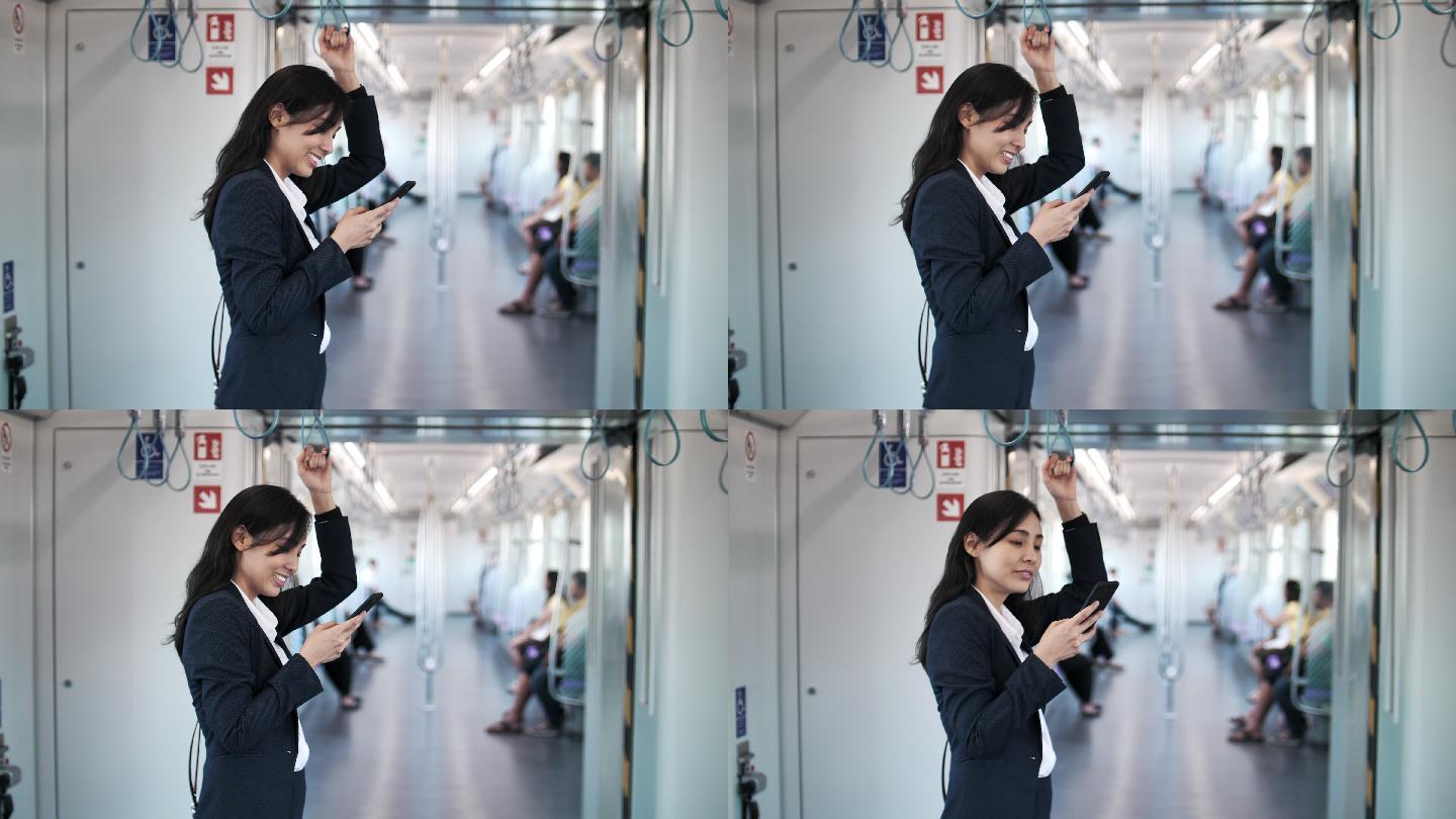 女商人在上下班途中在火车上使用智能手机