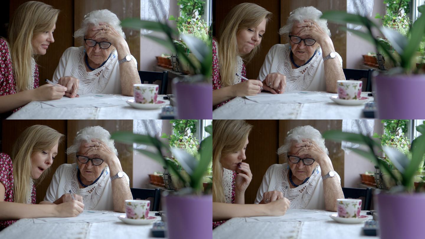 年轻女子帮助年迈的祖母做文书工作