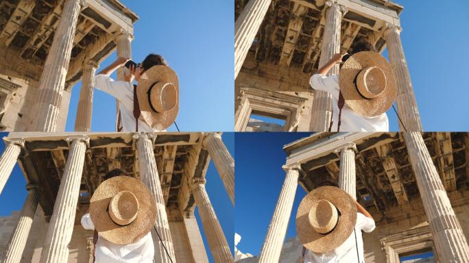 在希腊雅典卫城帕台农神庙拍照的年轻女子