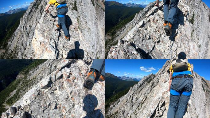 登山者攀登刀锋山脊