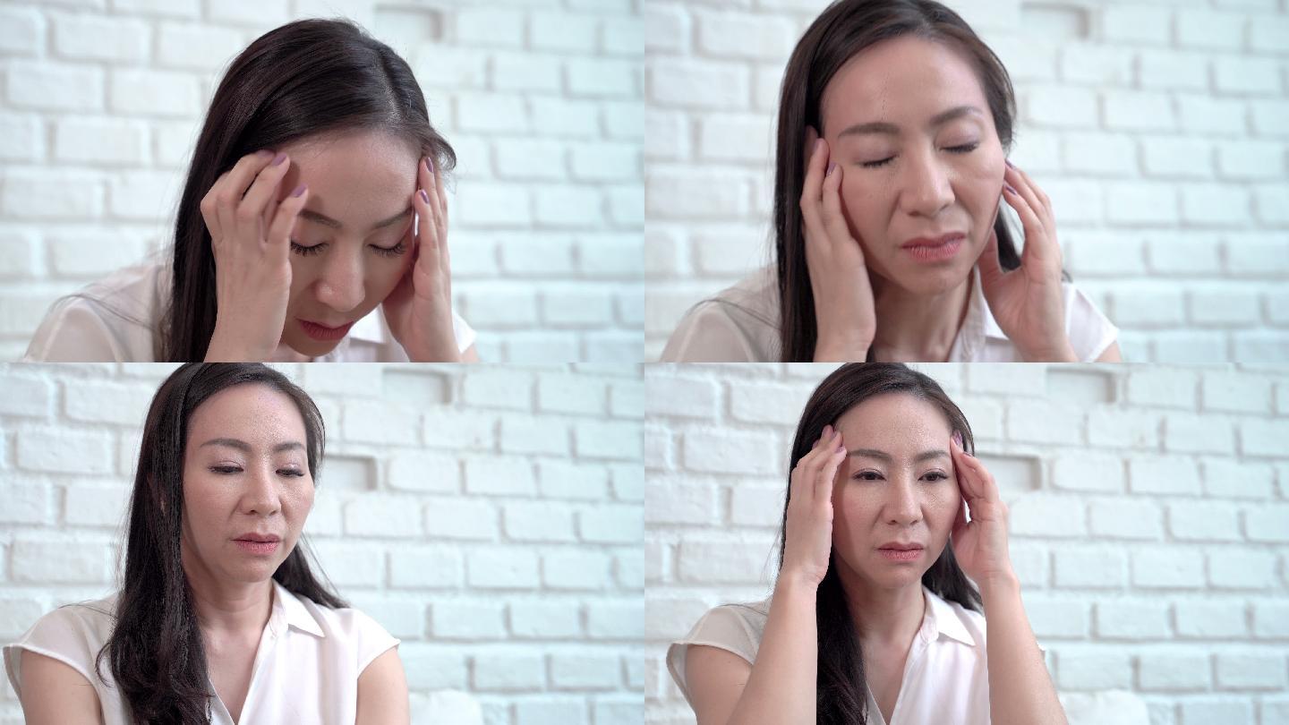 亚洲中年女性因极度疲劳而头痛
