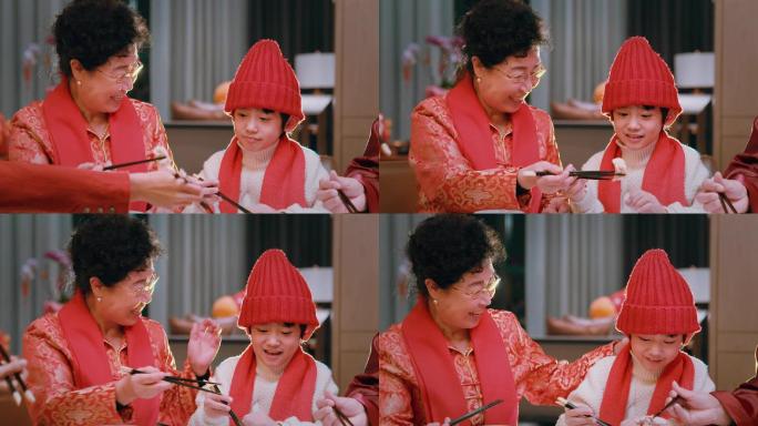 春节团年饭奶奶给孙子夹菜