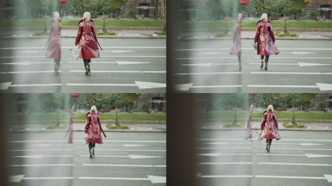 穿着红色皮衣走在街上的时髦女孩