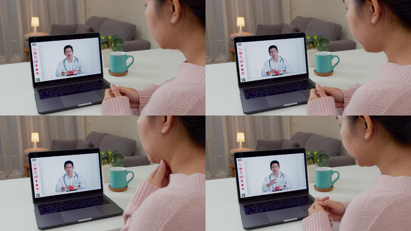女性在家与医生视频通话的后视图。
