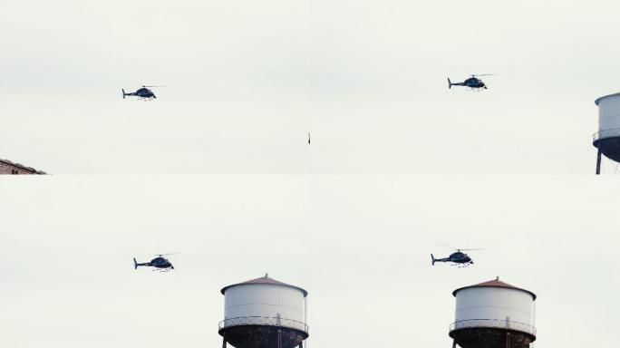 直升机飞越水塔巡逻