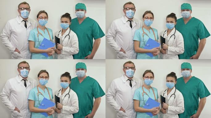 戴着医用口罩的医生的集体肖像。