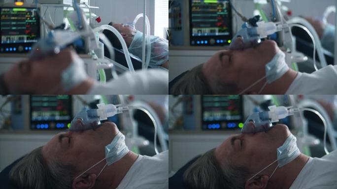 一名带呼吸机的男子躺在临床病房。