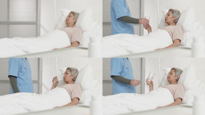 医生给女病人一杯水