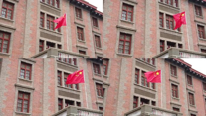 北京五四大街北大红楼外景国旗飘扬慢镜头