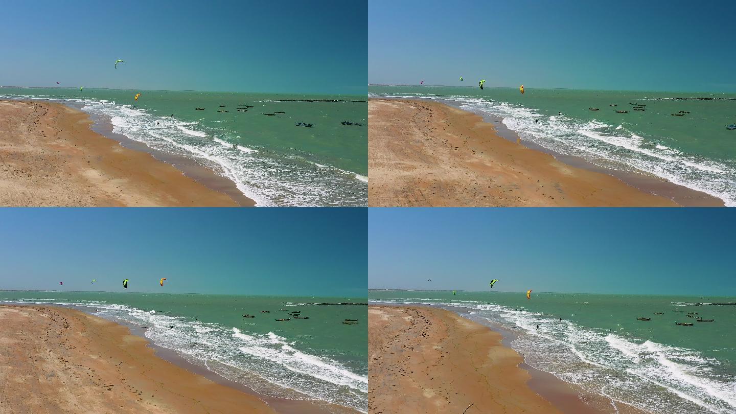 人们在巴西东北部的海滩上练习风筝冲浪