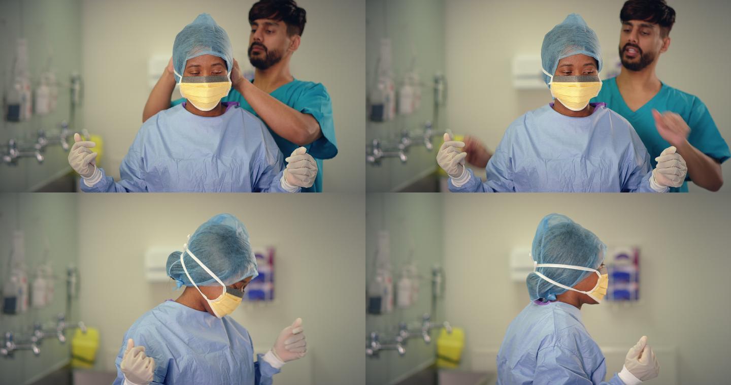 医务人员戴上口罩手术室主刀医生助力护士