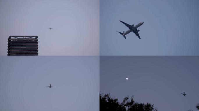 傍晚飞机降落飞过头顶月亮唯美画面