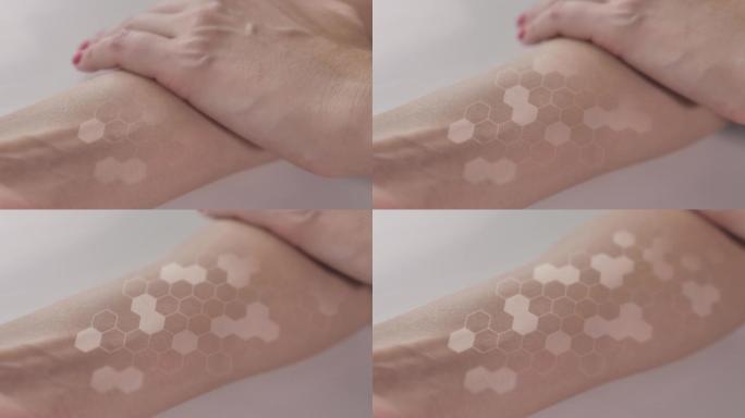 抚摸手腕部位光滑健康的皮肤。护肤用品