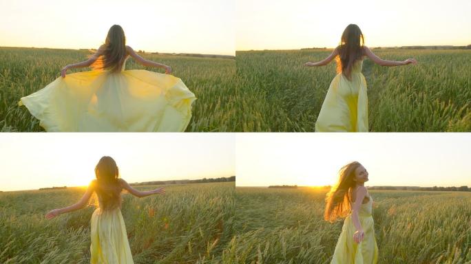 穿着黄色连衣裙的美丽女子在麦田上奔跑