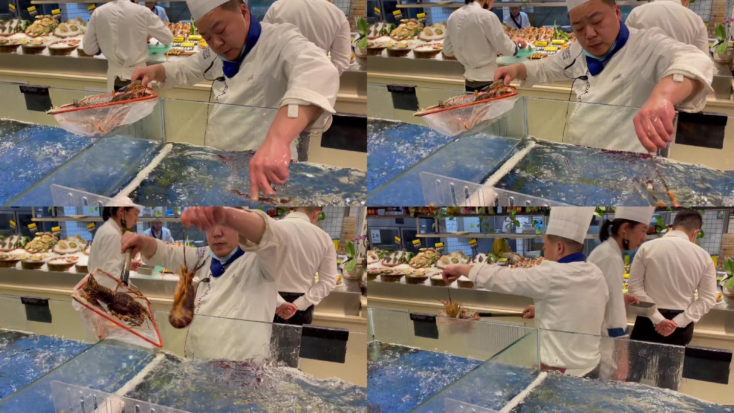 海鲜店厨师抓龙虾