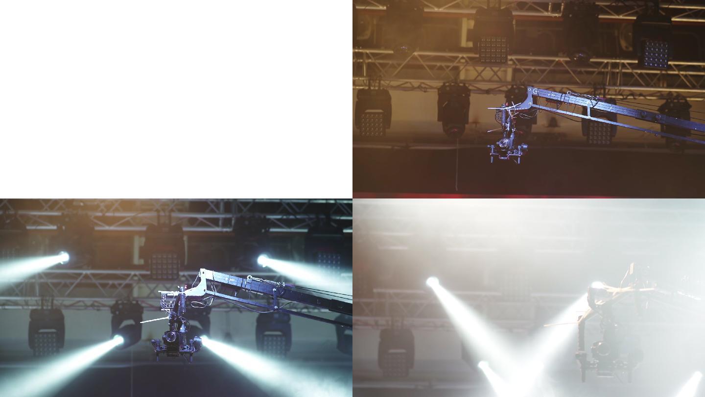 起重机上的摄像机在聚光灯的背景下