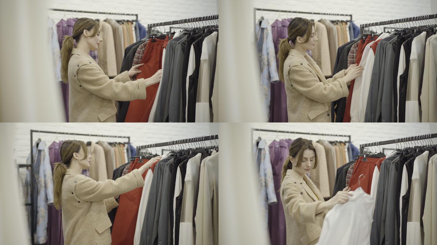 女性在商店里选择时尚服装的侧视图。