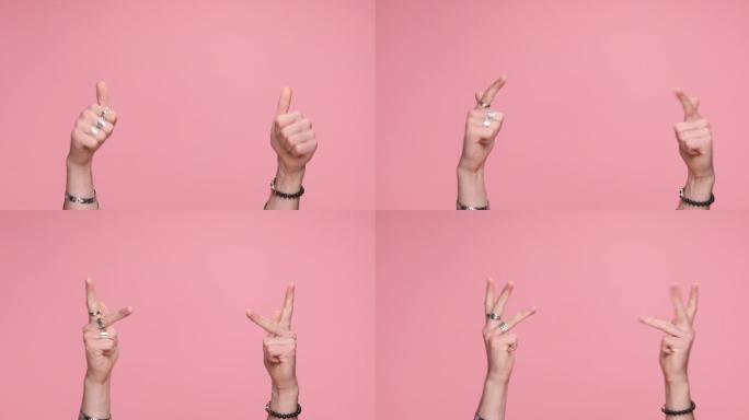 两只手在粉色背景上从一只手数到五只手