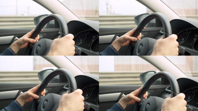 驾驶汽车手握方向盘