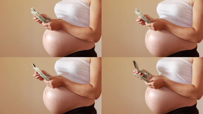数钱的孕妇孕期数钞票