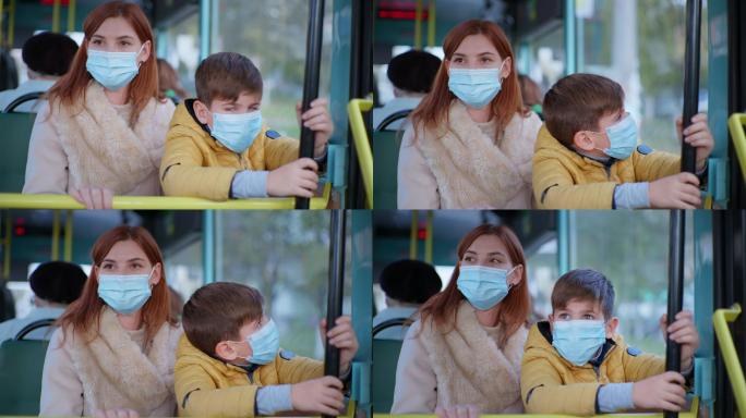 女子和儿子乘坐公交车