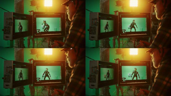 导演看着显示器，指导绿色屏幕CGI场景