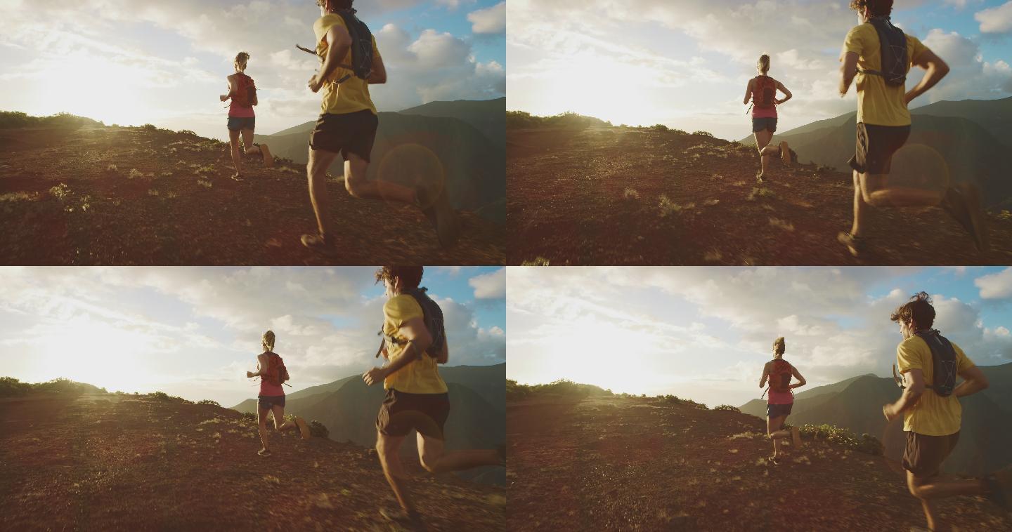 日落时分，两个年轻朋友一起在山顶上跑步