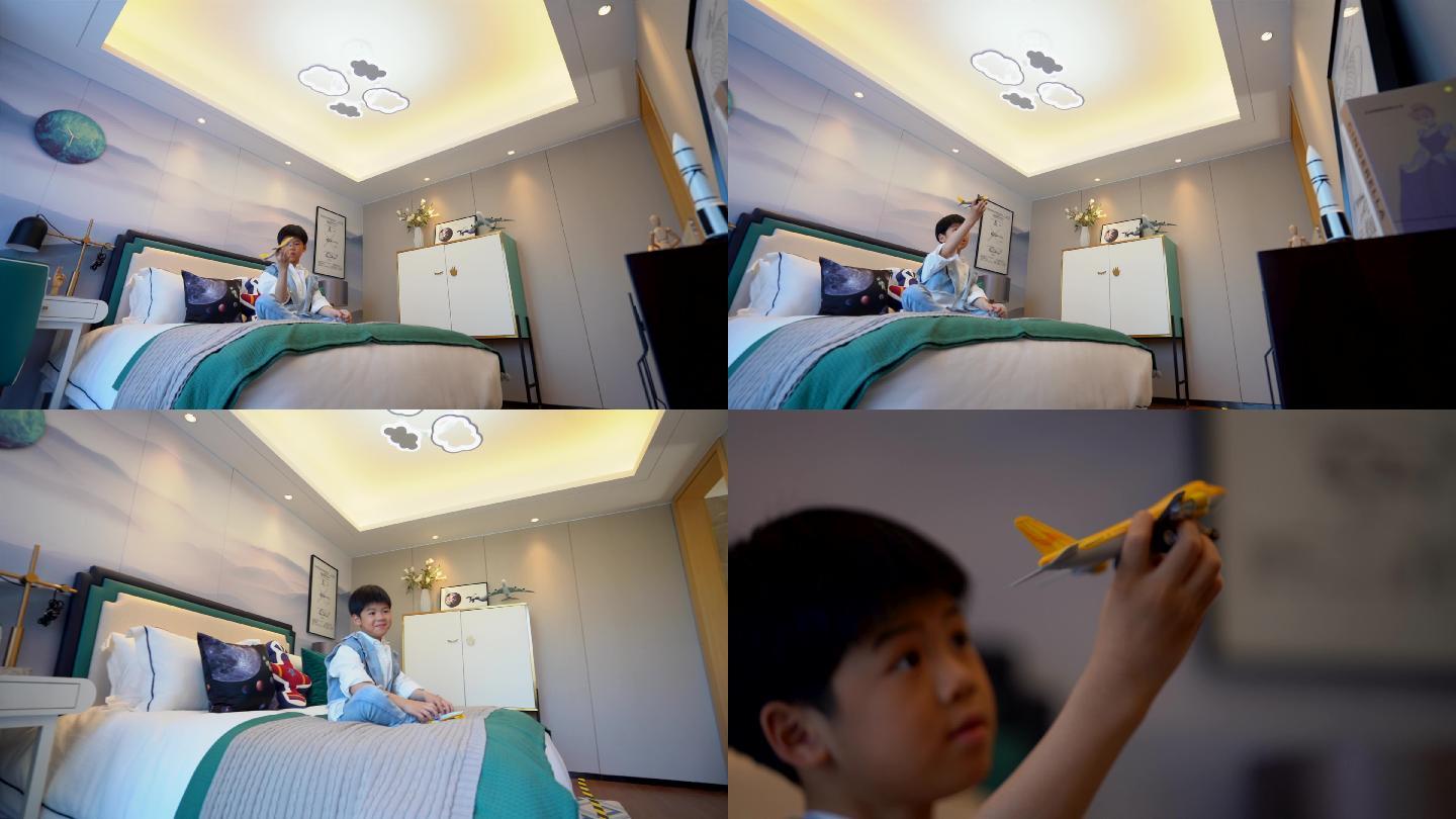 小男孩在房间玩飞机