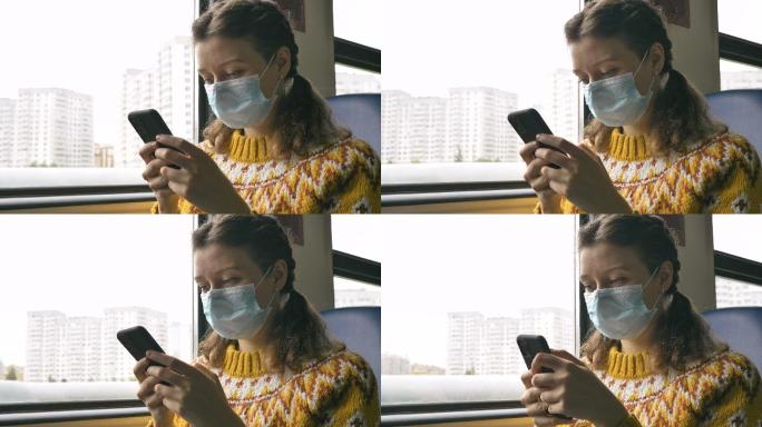 戴口罩的女人在公交车上玩手机