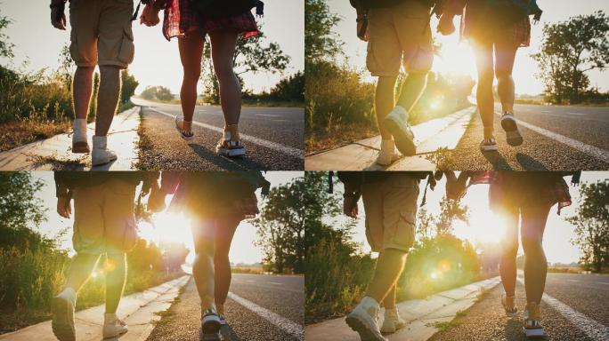 两个相爱的旅行者沿着日落大道散步