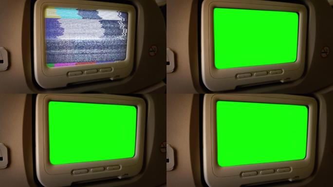 在飞机乘客座椅上安装绿色屏幕的显示器。