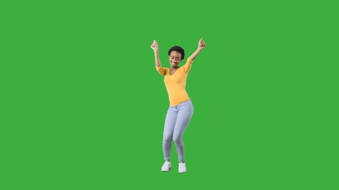 在绿色背景上跳舞的女人