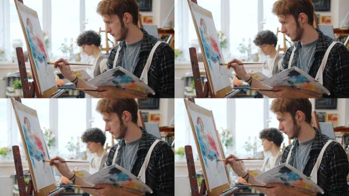男女艺术生在课堂上一起画画