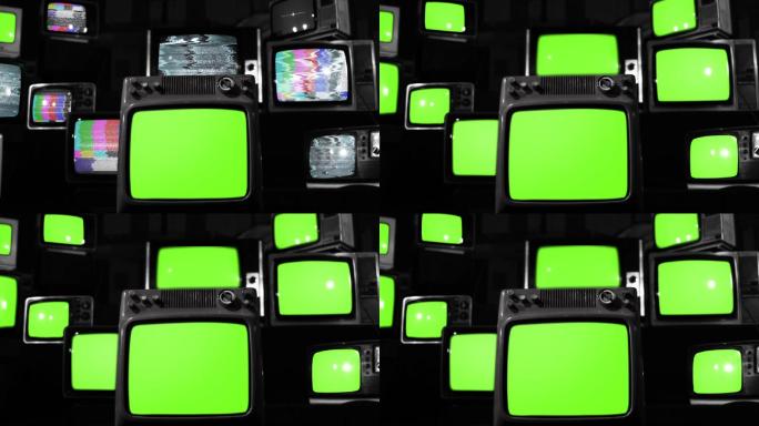 十台开着绿色屏幕的旧电视。