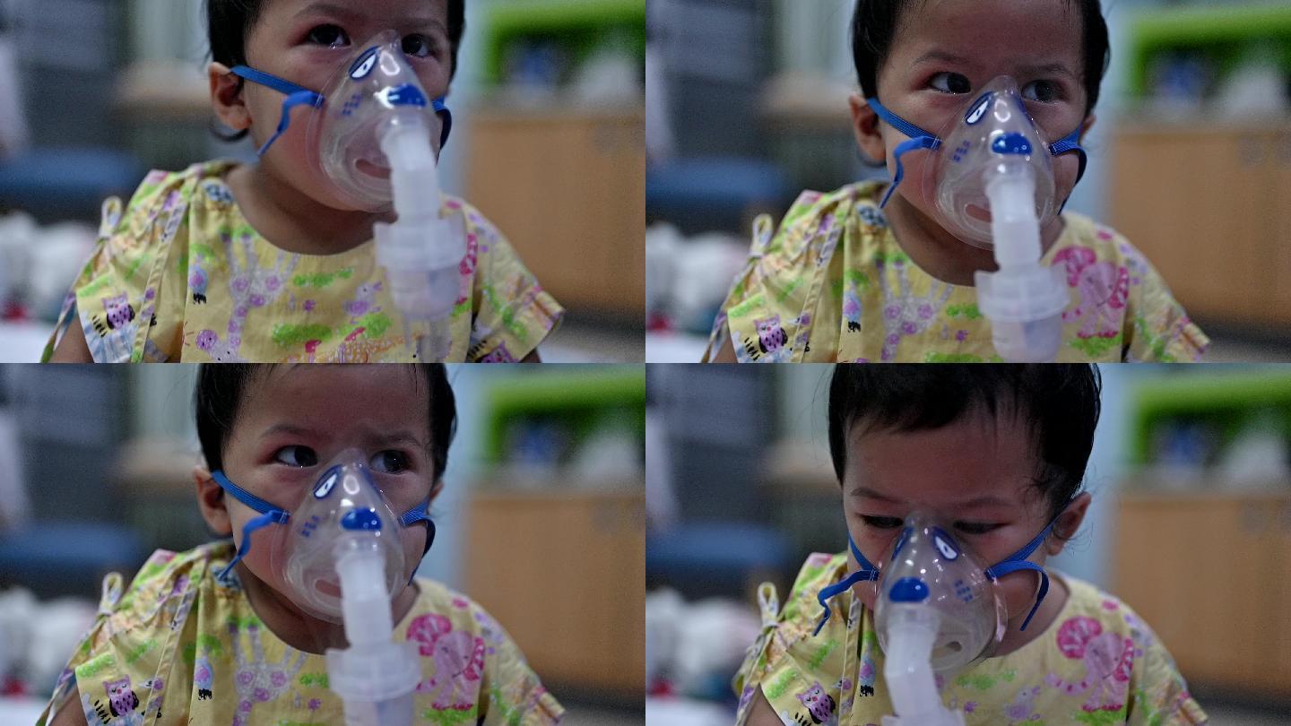 佩戴氧气面罩的小孩
