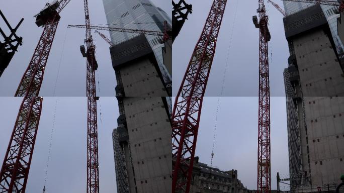 高耸的起重机在新摩天大楼工地