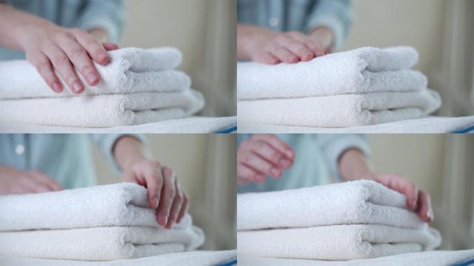 新鲜的白毛巾抚摸毛巾叠毛巾五星级酒店