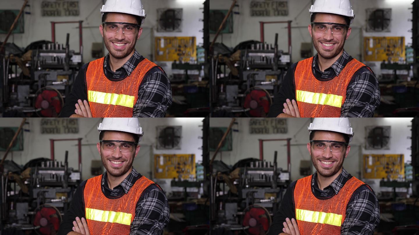 男性工程师双臂交叉微笑