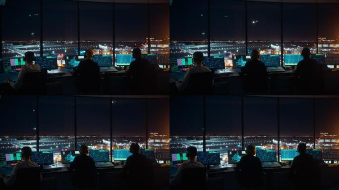 夜间在机场塔楼工作的空中交通管制团队。