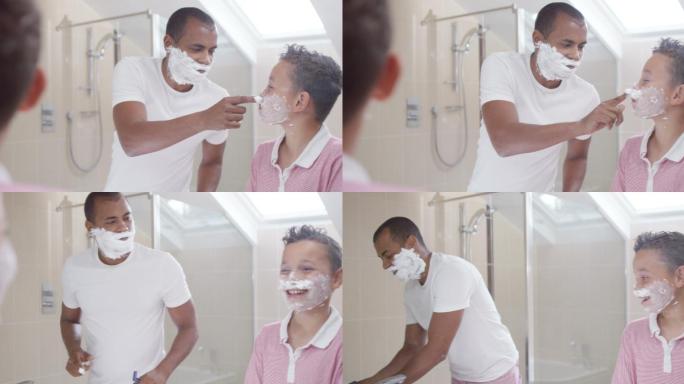 父亲教儿子在浴室刮胡子