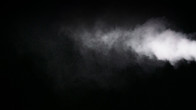 黑色背景上的抽象蒸汽喷雾