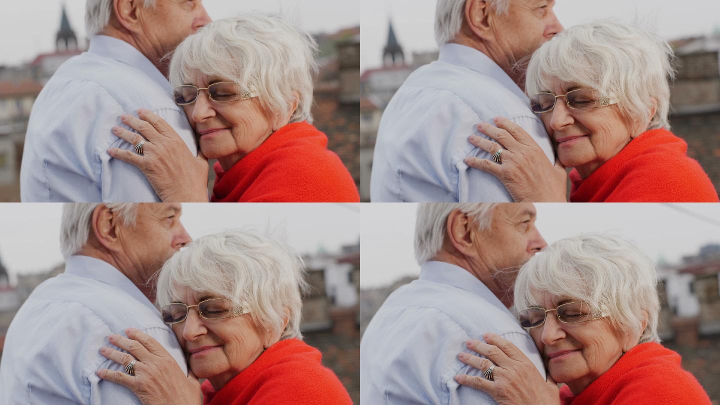 老年夫妇拥抱在一起