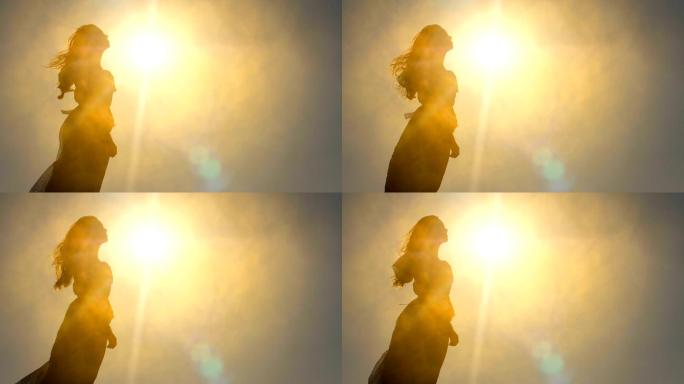 一个女人在阳光下的剪影