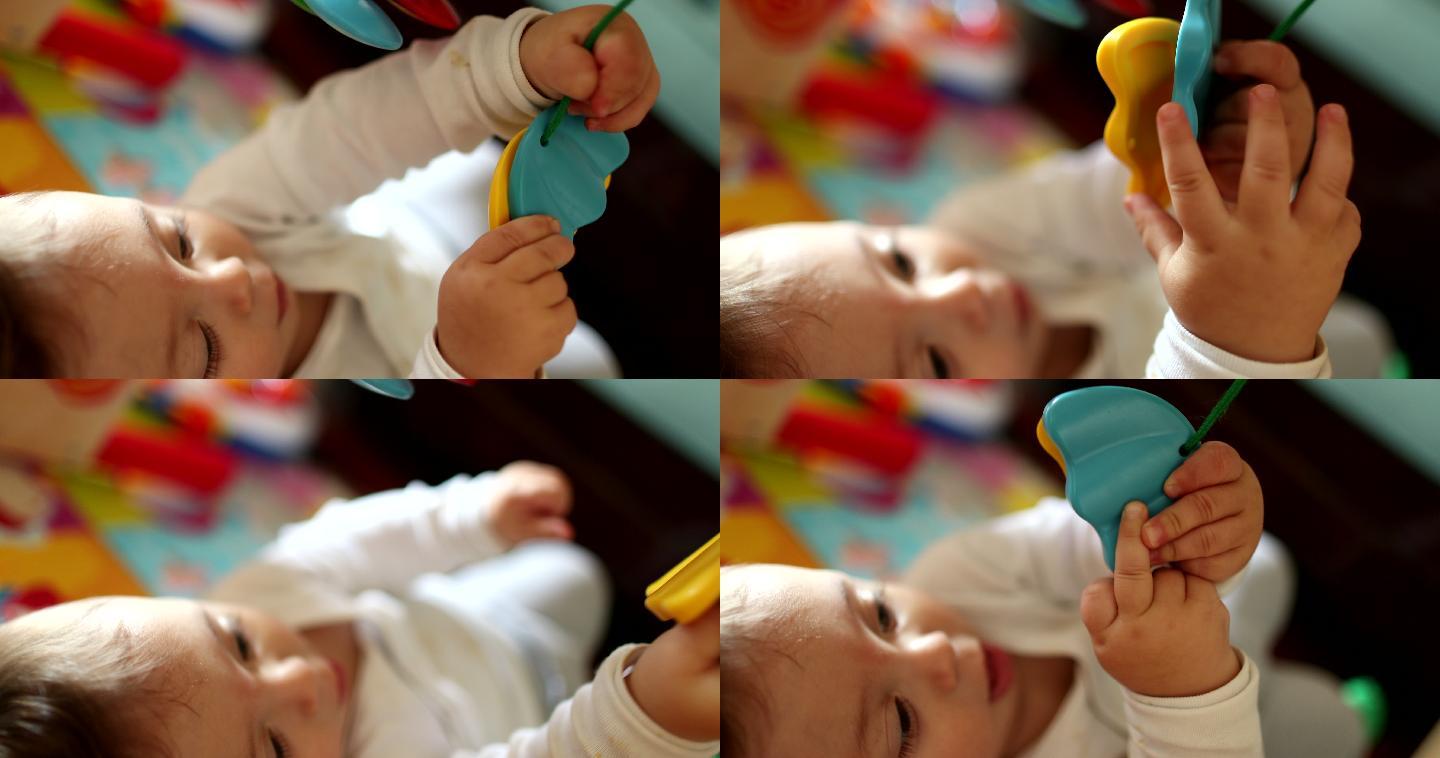 婴儿拿着玩具慢动作升格镜头外国小孩4K