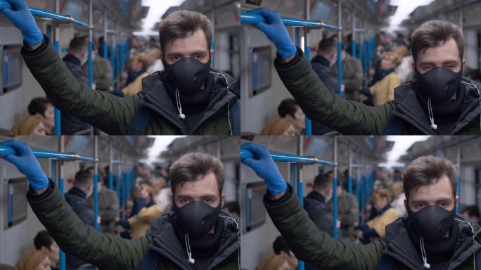 地铁里戴着防护面罩的男子