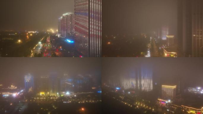 航拍雾天中的城市夜景