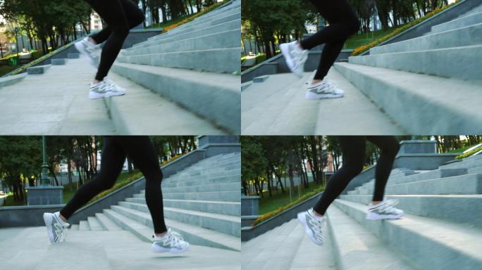 穿着运动鞋在城市楼梯上慢跑的女性