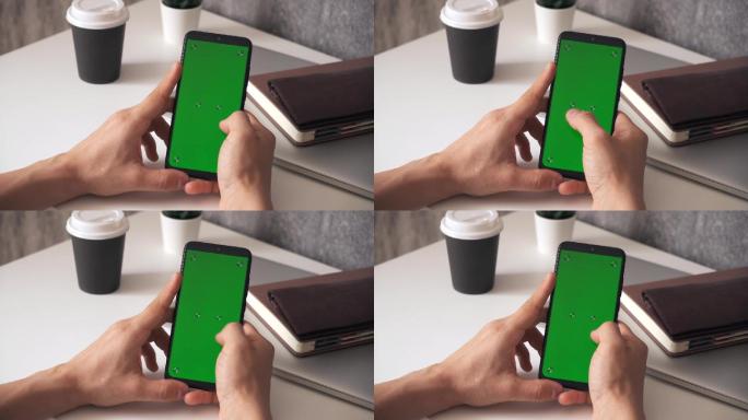 绿色屏幕手机的特写镜头。