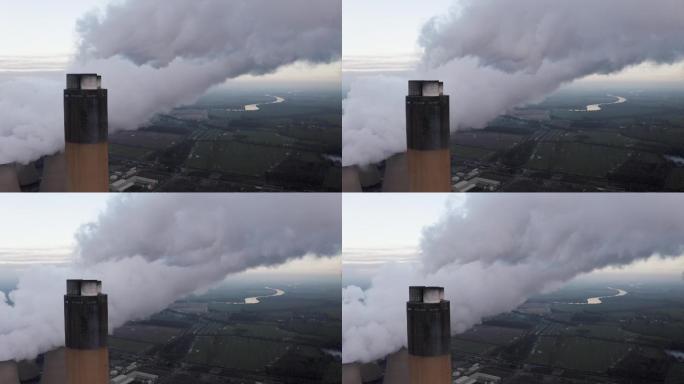 无人机拍摄的发电站烟囱排放污染物