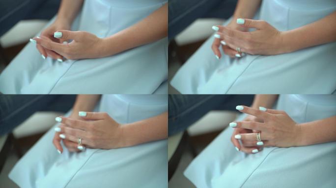 摆弄着戒指的女人婚礼布置浪漫钻戒结婚婚纱